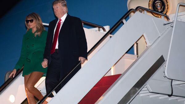 Президент США Дональд Трамп и его супруга Меланья после возвращения из Ирака в Вашингтон 