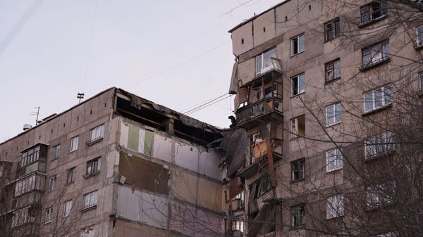 На месте обрушения одного из подъездов жилого дома в Магнитогорске. 31 декабря 2018 