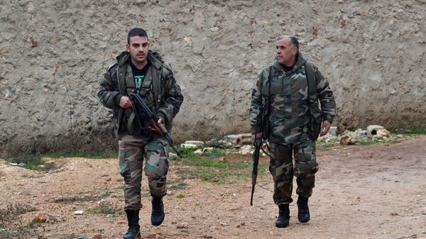 Военнослужащие сирийской армии на западе района Манбидж