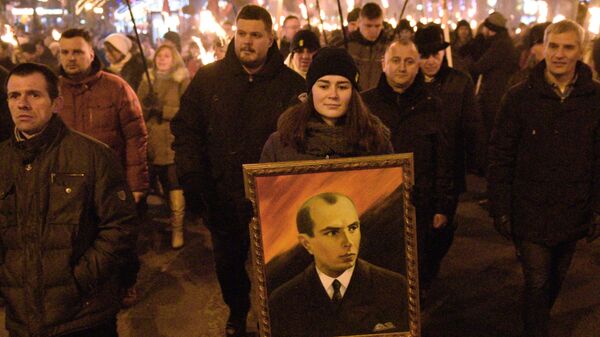 Участники факельного шествия националистов, приуроченного к 110-й годовщине со дня рождения Степана Бандеры в Киеве. 1 января 2019