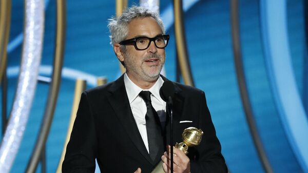 Мексиканский режиссер Альфонсо Куарон на церемонии вручении премии Золотой глобус