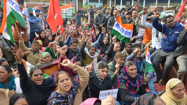 Индийские активисты принимают участие в митинге во время общенациональной забастовки. 8 января 2019 