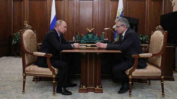 Президент РФ Владимир Путин и президент РАН Александр Сергеев во время встречи. 9 января 2019