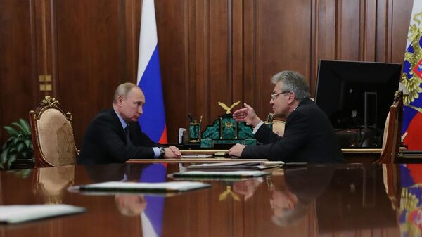 Президент РФ Владимир Путин и президент РАН Александр Сергеев во время встречи. 9 января 2019 