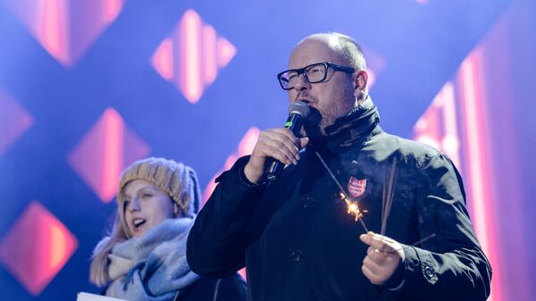 Мэр польского Гданьска Павел Адамович во время благотворительного концерта. 13 января 2018 