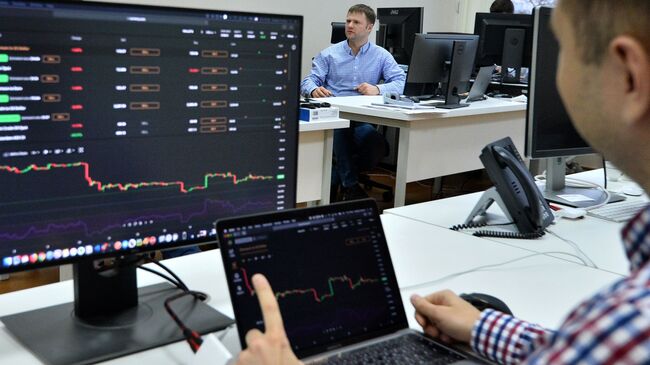 Сотрудники биржи криптовалют в Минске