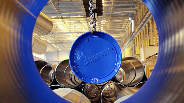 Логотип Газпрома на заводе по производству труб для газопровода