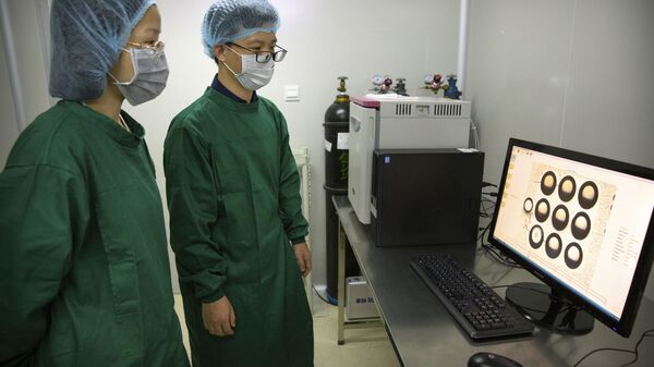 Сотрудники лаборатории ученого Хэ Цзянькуя, проводившие исследования, связанные с редактированием ДНК эмбрионов
