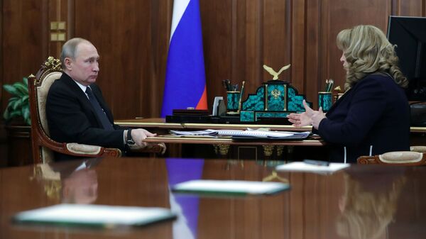Президент РФ Владимир Путин и председатель ЦИК РФ Элла Памфилова во время встречи