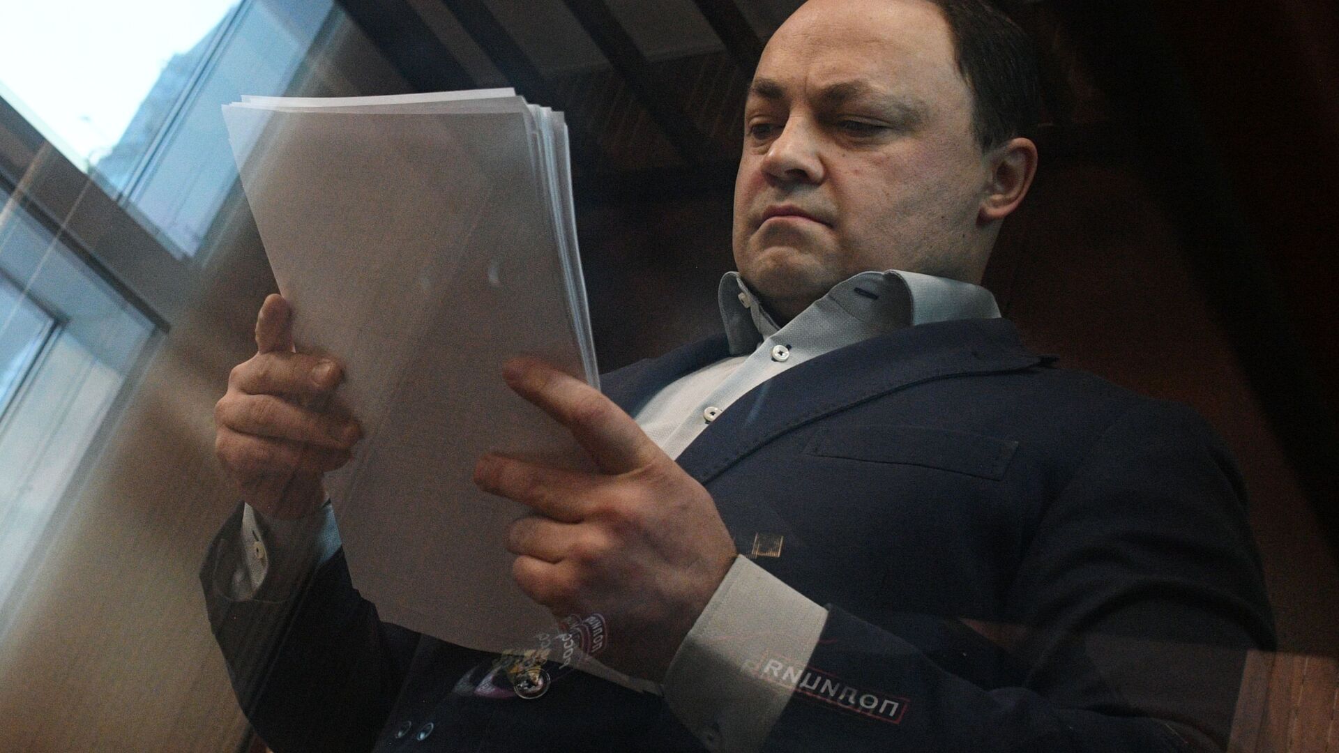 Бывший мэр Владивостока Игорь Пушкарев, обвиняемый во взяточничестве, во время заседания в Тверском суде Москвы. 25 января 2019 - РИА Новости, 1920, 22.09.2025