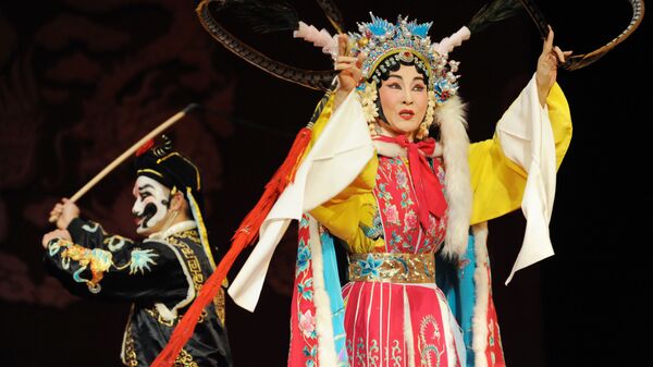 Артистка китайской оперы Гуо Гуанг Вей Хай-Мин в сцене из спектакля Отвергнутая невеста