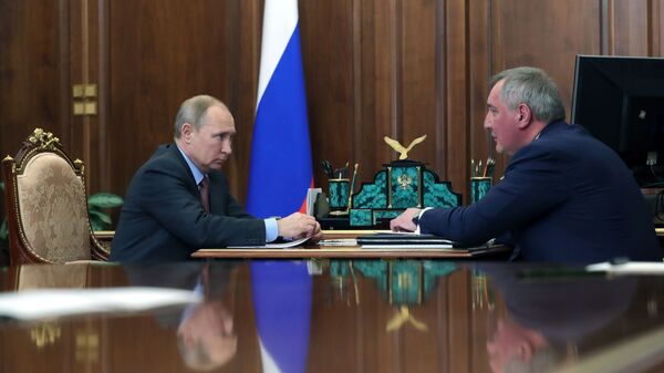 Владимир Путин и генеральный директор госкорпорации Роскосмос Дмитрий Рогозин во время встречи. 4 февраля 2019