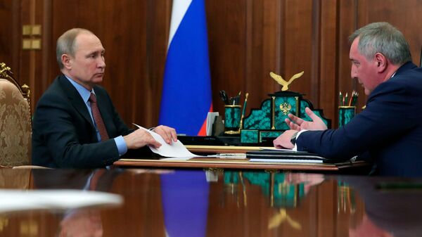 Владимир Путин и генеральный директор госкорпорации Роскосмос Дмитрий Рогозин во время встречи. 4 февраля 2019