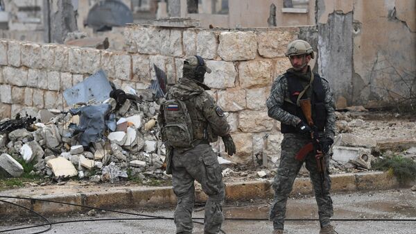 Сирийские военнослужащие и бойцы ополчения в провинции Хама. Архивное фото