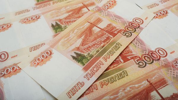 ЦБ летом представит модернизированные банкноты номиналом 1000 и 5000 рублей