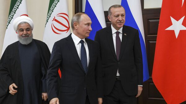 Президент РФ Владимир Путин с президентом Исламской Республики Иран Хасаном Рухани и президентом Турецкой Республики Реджепом Тайипом Эрдоганом в Сочи