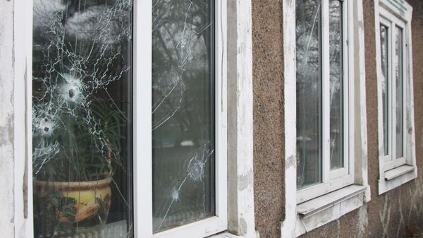 Последствия обстрела поселка Старомихайловка в Донецкой области