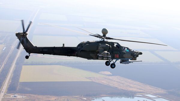 Вертолет Ми-28УБ во время учебно-тренировочных полетов экипажей армейской авиации Южного военного округа  