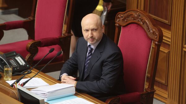 Исполняющий обязанности президента Украины Александр Турчинов на заседании Верховной рады в Киеве