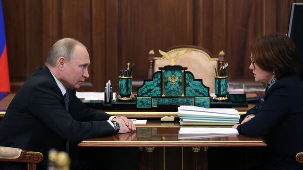 Президент РФ Владимир Путин и председатель Центрального банка РФ Эльвира Набиуллина во время встречи. 4 марта 2019