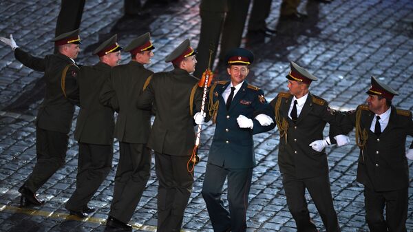 Сводный военный оркестр войск национальной гвардии выступает на закрытии XI Международного военно-музыкального фестиваля Спасская башня