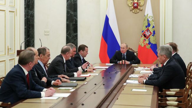 Президент РФ Владимир Путин на совещании с постоянными членами Совета безопасности РФ. 13 марта 2019