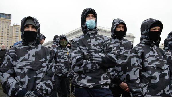 Участники акции национального корпуса против коррупции, на площади Свободы в Киеве. 16 марта 2019