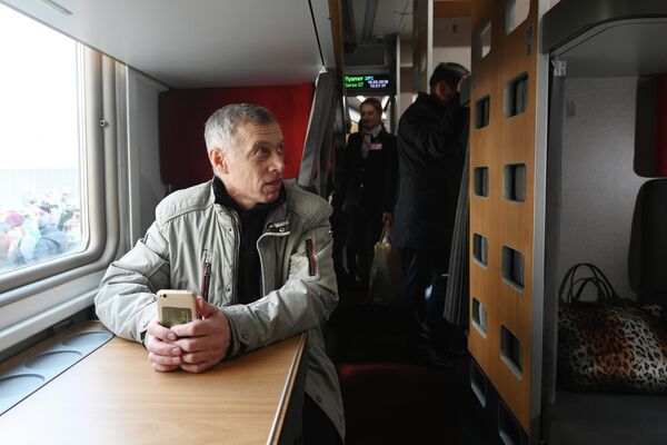 Пассажиры в модернизированном плацкартном вагоне, первый рейс которого пройдет по маршруту Ростов-на-Дону - Москва