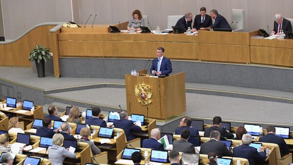 Министр труда и социальной защиты РФ Максим Топилин выступает на пленарном заседании Государственной Думы РФ. 20 марта 2019