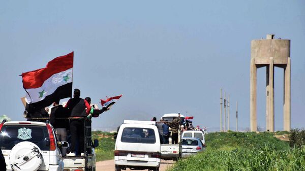 Местные жители возвращаются в освобожденные от террористов населенные пункты в провинции Хомс, Сирия