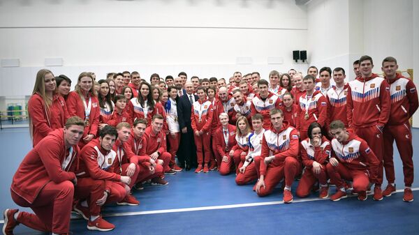 Владимир Путин во время встречи с победителями XXIX Всемирной зимней универсиады 2019 года