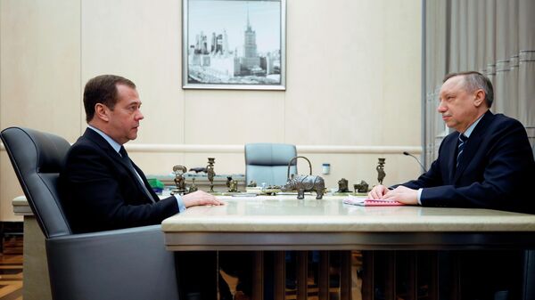  Председатель правительства РФ Дмитрий Медведев и врио губернатора Санкт-Петербурга Александр Беглов во время встречи. 27 марта 2019
