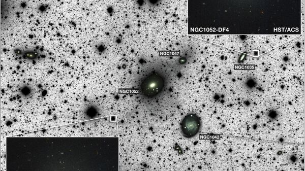 Две галактики в созвездии Волос Вероники, полностью лишенных темной материи