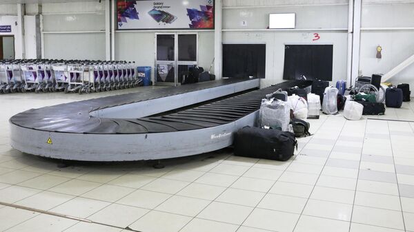 В аэропорту Триполи Митига после столкновений, Ливия