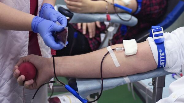Сдача крови в мобильной станции переливания крови