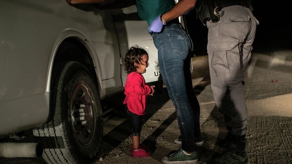 Crying Girl on the Border фотографа John Moore, Фото года в фотоконкурсе World Press Photo 2019