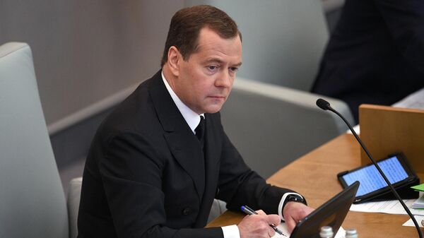 Председатель правительства РФ Дмитрий Медведев после выступления в Государственной Думе РФ