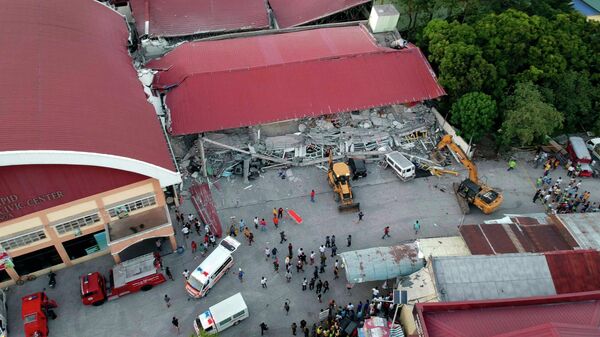 Ликвидация последствий землетрясения в городе Порак на Филиппинах. 23 апреля 2019