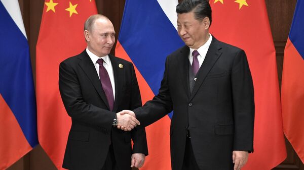Президент РФ Владимир Путин и председатель Китайской народной республики Си Цзиньпин. 26 апреля 2019