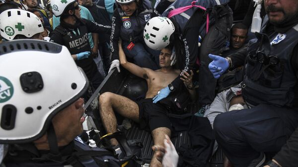 Раненый в столкновении с Национальной гвардией Венесуэлы в Альтамире, районе Каракаса
