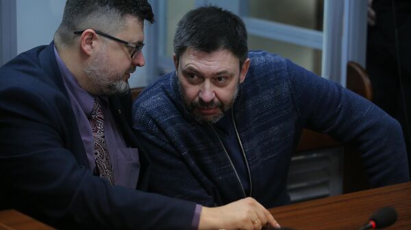 Руководитель портала РИА Новости Украина Кирилл Вышинский в Подольском районном суде Киева.