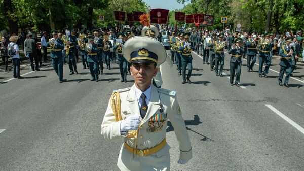 Музыканты военного оркестра во время акции Бессмертный полк в Алма-Ате