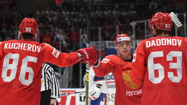 Хоккеисты сборной России Никита Кучеров, Никита Гусев и Евгений Дадонов 