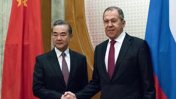 Министр иностранных дел России Сергей Лавров и министр иностранных дел Китая Ван И во время встречи в Сочи. 13 мая 2019