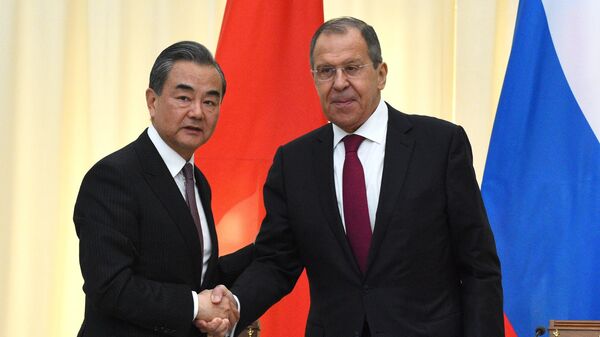 Министр иностранных дел России Сергей Лавров и министр иностранных дел Китая Ван И