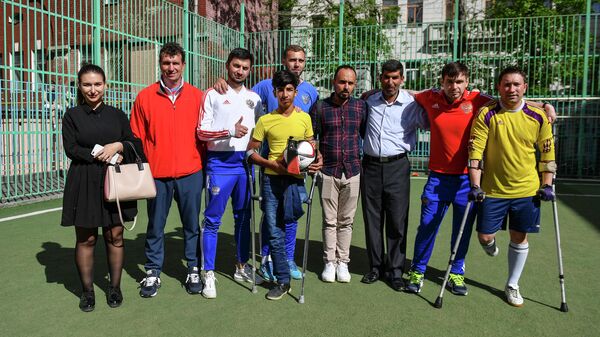Касим Алькадим со спортсменами паралимпийской сборной России по футболу