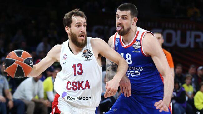 Адриен Морман и Серхио Родригес (слева)