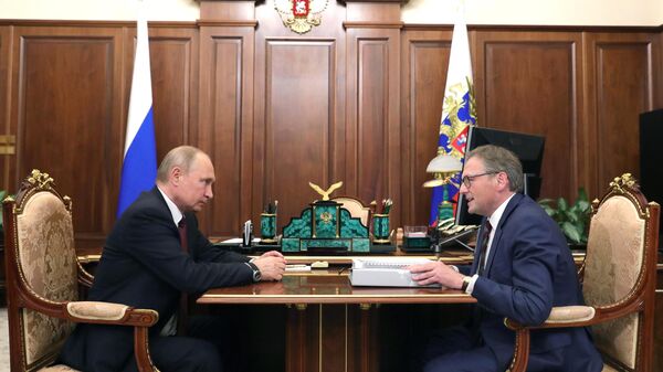 Владимир Путин и уполномоченный при президенте РФ по защите прав предпринимателей Борис Титов