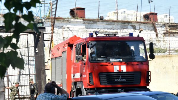 Машина пожарной службы на территории Южной исправительной колонии общего режима №51 в Одессе, где произошло массовое неповиновение заключенных. 
