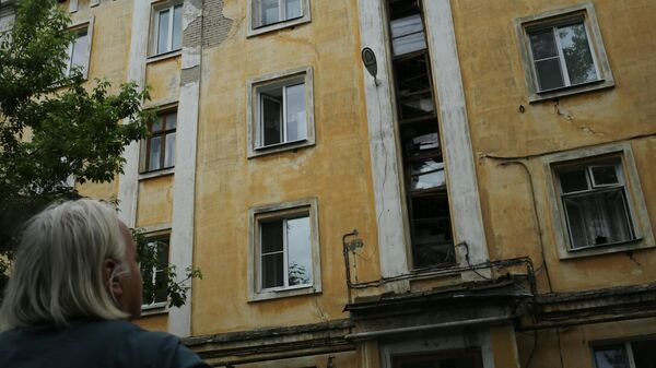 Разбитые стекла в жилом доме в Дзержинске